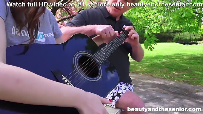 Senior Student Enjoys Some Guitar Lessons With Grandpa